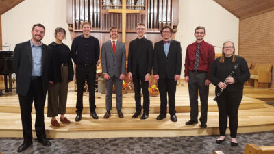 Composers from left to right: John Kosch, (professor), Hannah Cmeyla, Calvin Rohde, Ethan Gillespie, Nathan Pennington, Ryan Edinger, Nathaniel Mars, Kendra Johnson