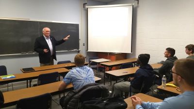 Kenlon Johannes '71 presents to an ag class at Concordia