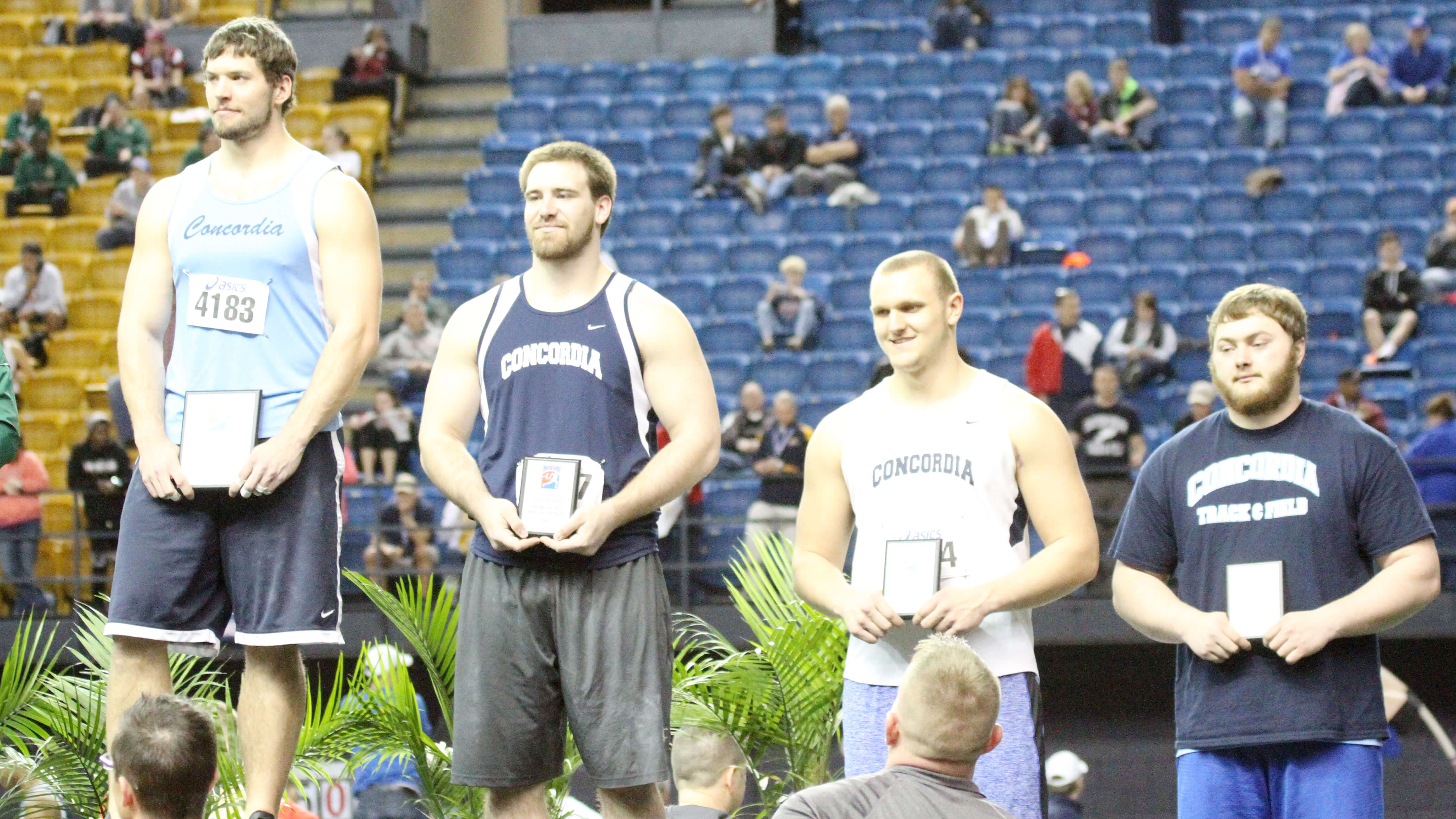 Boellstorff wins weight throw title; nine other Bulldogs named All