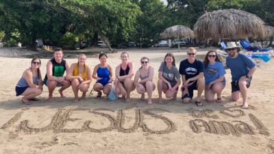 On a beach in the Dominican Republic. Pictured from left to right: Rebekah Freed, Nathan Birtell, Katie Anderson, Rosanna Scott, Autumn Johnson, Karissa Ternus, Christina Lee, Owen Dawson, Abigail Dawson and Brian Gauthier.