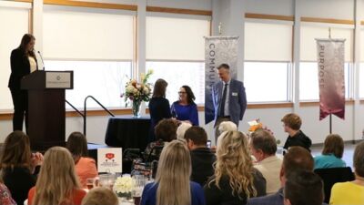 Diane Lichty receives her award from first lady Joyanna Bull.