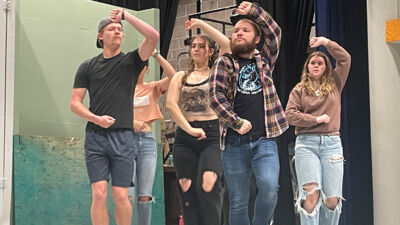 From left to right: Andrew Ring, Aly Gobin, Naomi Faile, Adam Prince, and Emma Wakley practice a tango number for the show. Photo credits: Madeline Hutson-Knowlton