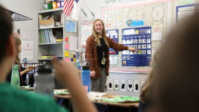 A Concordia faculty member talking to a student