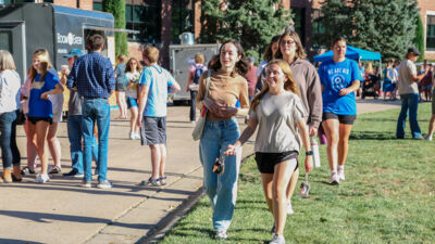 Concordia students making their way to a food truck for Dinner and a Movie