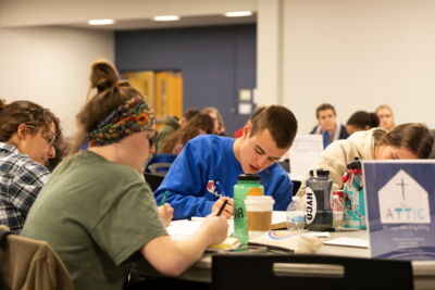 Students participating in the campus wide Bible study, The Attic.