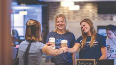 Students in line for coffee at 10:31 coffee shop