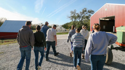 The Uzziah scholars visit a local produce farm and walk around the farm on a tour.
