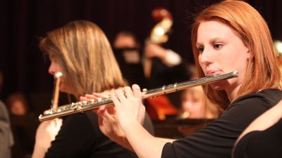 Student playing flute at Concordia University, Nebraska