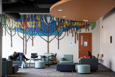 Students sit in Janzow Campus Center