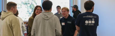 Students talk to one another throughout the Nebraska Tech Builders Competition