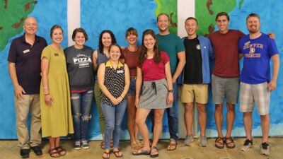 Rev. Dr. John Mehl and CUNE Alumni at the 2022 Concordia Mission Institute. Pictured (l-r): Back: Rev. Dr. John Mehl, Tiffany Smith (LBT), Ashley Johnson, Ruth Moon, Amanda and Ethan Hutton, Zach Barz, Brandon Holmes and Joel Endorf. Front: Maria Sasieta and Clara Rich. 