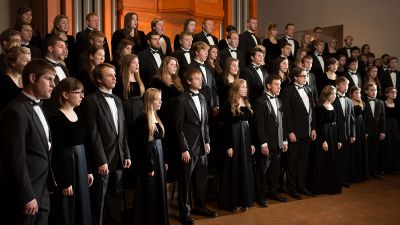 A Cappella Choir practicing in the front of the Recital Hall